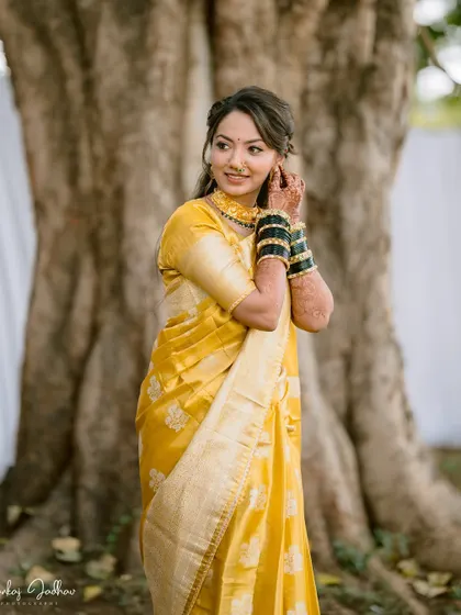 A beautiful three-quarter portrait of the bride, capturing her serene smile.