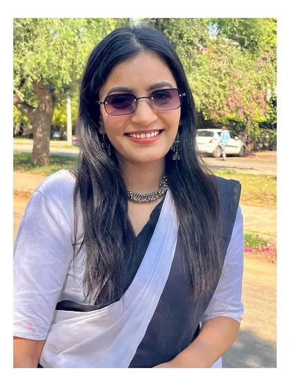 A confident smile, ready for the professional world. My legal education has prepared me to be a formidable opponent in any cyber law case.