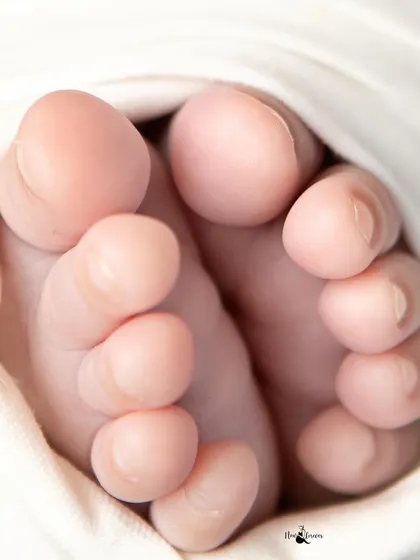 The tiniest details are often the most precious. I make sure to capture close up shots of your newborn's tiny feet and hands. These are the details you will want to remember long after they have grown.