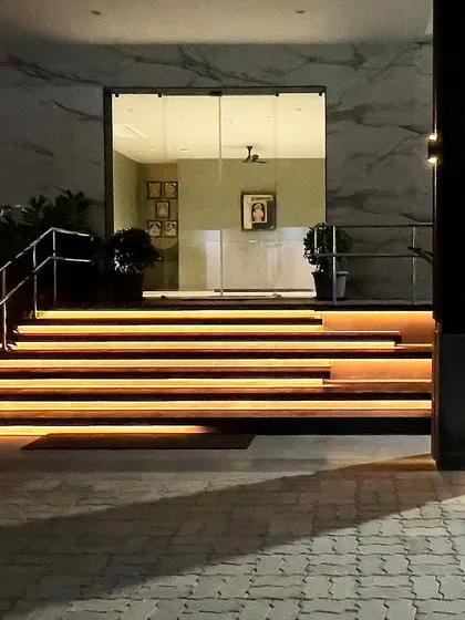 A duplicate image of the beautifully lit entrance stairs.