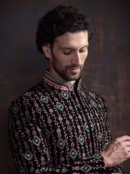 A closer look at the detailed embroidery on the patterned bandhgala. This piece is a perfect example of how I elevate classic silhouettes with unique, modern craftsmanship.