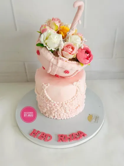 A full view of the stunning floral umbrella cake, a true work of edible art.