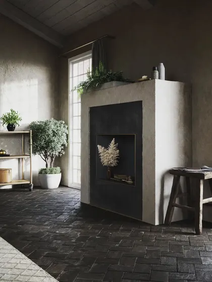 This design explores a rustic and earthy aesthetic. The dark herringbone floor tiles, textured walls, and simple wooden furniture create a space that feels grounded, calm, and connected to nature.