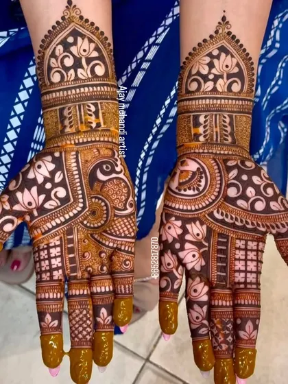 A beautiful example of Indo-Arabic bridal design, combining the boldness of Arabic patterns with the detailed fillers of Indian mehndi.