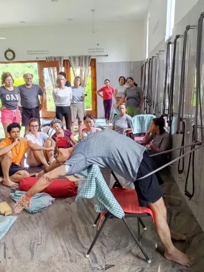A demonstration of a supported backbend using the wall ropes at our Ramanagara centre. The studio is fully equipped for all aspects of Iyengar yoga.