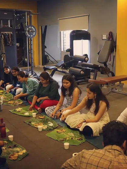 A full view of our team enjoying a meal on the clinic floor. This is a testament to the strong, family like bond we share.