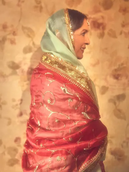 The timeless Neena Gupta in a beautiful heritage look for 'Dastoor'. The combination of the mint green suit and the contrasting red and gold dupatta is a classic pairing.