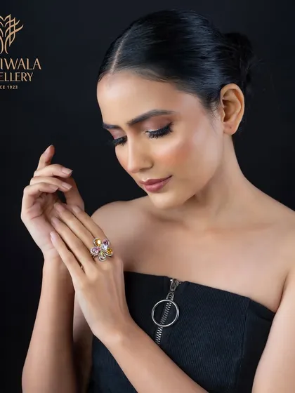 A playful yet elegant floral ring featuring multi-colored gemstones. This piece showcases my love for combining different colors and cuts to create a jewel that is full of life and personality.