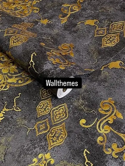 A sophisticated black wallpaper with a textured finish and a gold damask pattern.