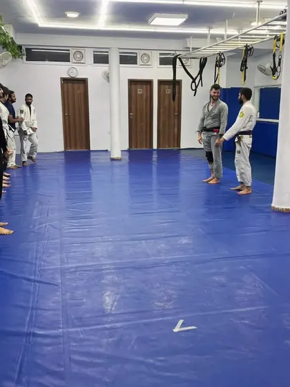 Respect and discipline are the foundation of martial arts. Here, students line up at the start of a seminar, ready to learn and challenge themselves, showing the formal structure of our training.