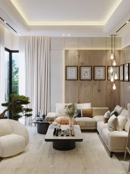 A serene living area designed with a neutral color palette and warm wood accents. The layout is open and inviting, with large windows that flood the space with natural light.