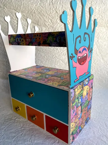This headband holder with multiple drawers is perfect for organizing a little princess's hair accessories. This one has a fun and quirky monster theme.