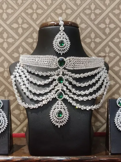 The same stunning multi-layered choker, but with emerald-green stones. I offer various color options to match your outfit.