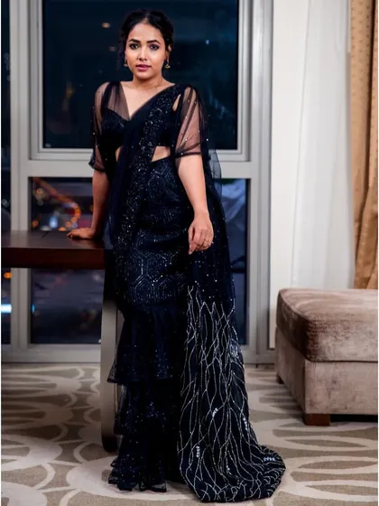 Anupama Gowda looking powerful and elegant in the black tiered saree-gown I designed for the SIIMA red carpet.