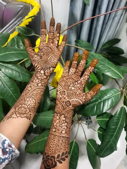 An intricate floral and geometric design, perfect for a wedding guest or bridesmaid.