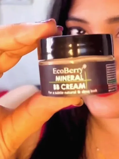 A customer holding my Mineral BB Cream, ready to achieve that natural, flawless glow.