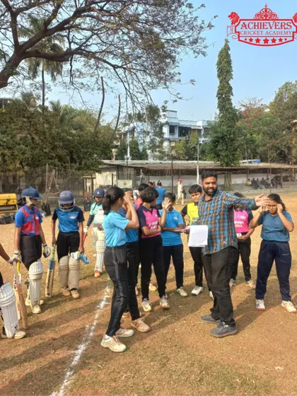 Our coaches briefing the aspiring players during the girls' team selection trials. Clear communication and encouragement are core to our process.