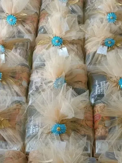 A closer view of the custom wedding favors. You can see the detail in the packaging and the mix of snacks and treats inside.
