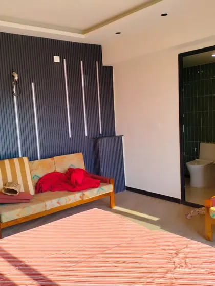 This view shows the layout of the terrace bedroom and its attached modern bathroom, demonstrating our capability to build fully functional living quarters.