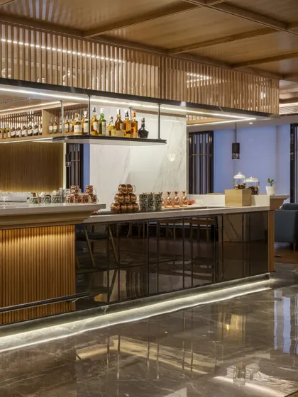 Additional views of the Radisson Resort, Khopoli, showcasing various interior and exterior details, from lobby seating areas and restaurant layouts to guest room configurations and architectural elements.