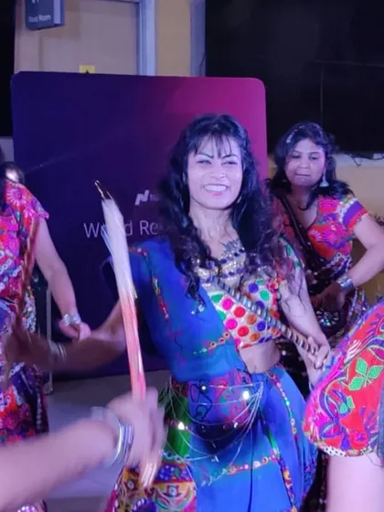 A happy, smiling shot of me in the middle of a Dandiya circle. This is my element.