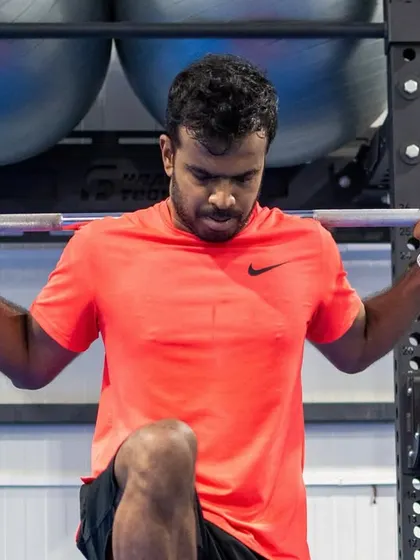 An athlete performs a barbell step-up at our Jayamahal facility. This center is where training meets performance for everyone who walks through our doors.