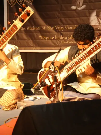 Two of my students performing a sitar jugalbandi. These collaborative performances teach them how to listen and respond to another musician, a key skill in Indian classical music.