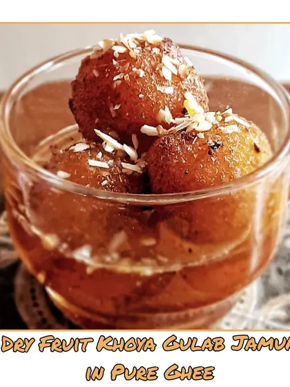A close up of my homemade Dry Fruit Khoya Gulab Jamun, fried in pure ghee and soaked in sweet syrup. It’s the perfect sweet ending that I often include in my special weekend meals.