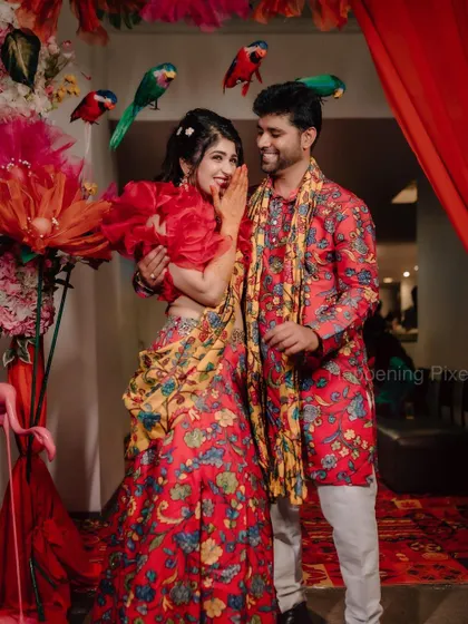 I love adding unique details, like these colourful parrots perched above the couple. It's these small, creative touches that make the decor personal and memorable.