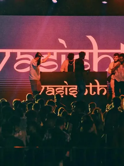 A wide shot of the stage and crowd at a "WE CONCEPTS" show, highlighting our branding and stage presence.
