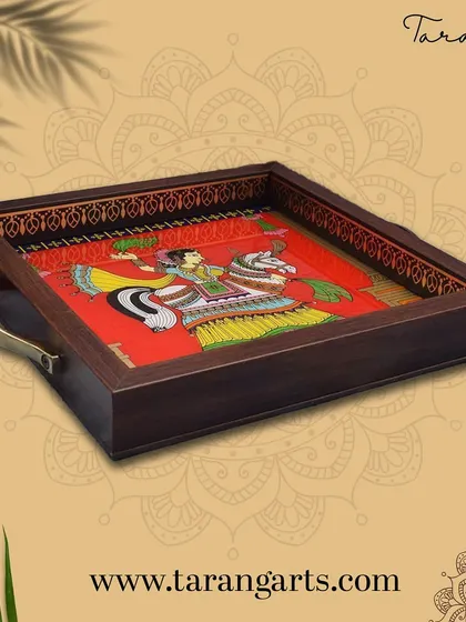 A glass painting capturing the energy and joy of a village folk dance. This artwork is a celebration of Indian culture and heritage, rendered in the luminous and vibrant style of glass painting.