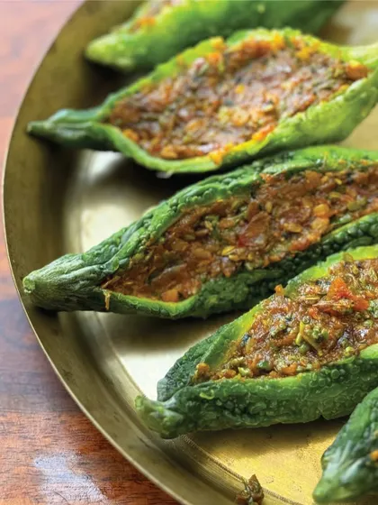 Bharwan Karela (stuffed bitter gourd), a multi-generational recipe from Punjab that serves as 'musafir khaana' (travel food).