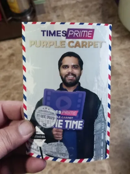 This AR Photo Booth souvenir from the Times Prime Purple Carpet event shows a guest holding a virtual prop. Augmented reality allows us to add interactive digital elements to photos, enhancing the fun and creative possibilities.