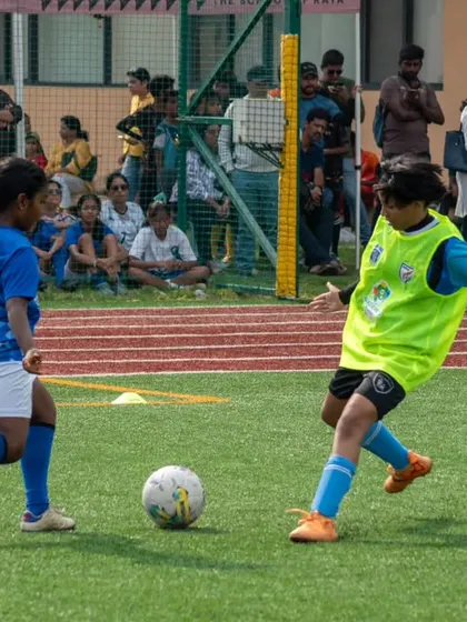 A one-on-one battle during a youth league match, highlighting the competitive spirit and individual skill of our young players.