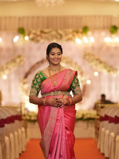 Madhushree making her entrance at her engagement. Her makeup is designed to be impactful and photograph beautifully from a distance.