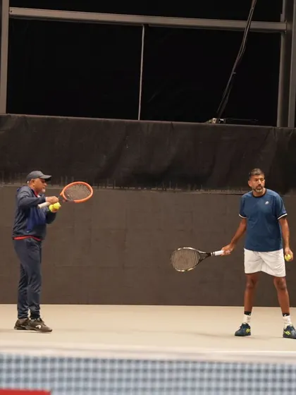 A practice session with my coach, working on specific patterns and shots.