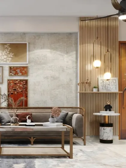 This living room features a modern interpretation of Indian design, with a jali-patterned door and a gallery wall of traditional art set in a contemporary, neutral space.