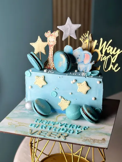 Halfway to one! We love celebrating tiny milestones with cute half-birthday cakes, like this hot air balloon teddy bear cake or the sweet blue animal-themed cake.