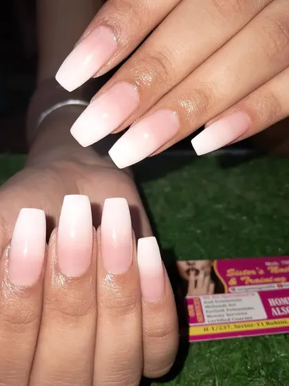 A still image of the classic and clean French ombre on coffin nails.