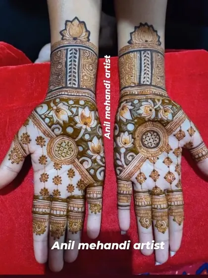 A beautiful design for the back of the hands, featuring a central mandala and lotus flowers. The patterns are elegant and symmetrical.