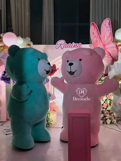 Adding a touch of fun with life-sized teddy bear mascots, perfect for entertaining the little ones and for adorable photo opportunities.