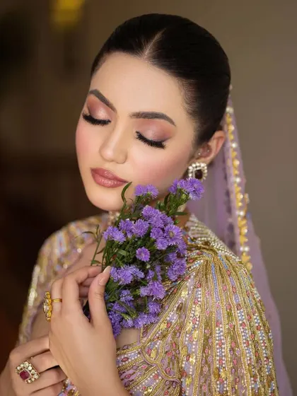 A dreamy, whimsical look featuring a multi-colored lehenga from Papa Don't Preach by Shubhika. The styling is soft and romantic, with a focus on the unique blouse and delicate jewelry, perfect for a day wedding or Mehendi.
