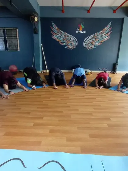 After a dynamic flow, we cool down with restorative poses like Balasana (Child's Pose). This helps calm the nervous system and release tension.