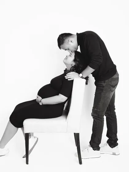 The same portrait in black and white. Stripping away the color brings the focus to the emotion and connection, creating a timeless and artistic image of this special moment.