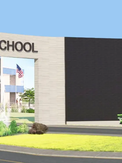 Another view of the Swarnprastha Public School entrance. The architecture is designed to be inspiring, with a strong foundation and modern aesthetic that shapes a positive environment for learning.