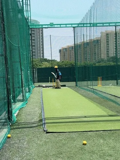 The setup for a long batting session, with plenty of balls ready for the drills.