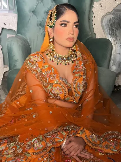 Another beautiful shot of my fall bride. The lighting catches the highlight on her cheekbones, emphasizing the radiant finish I always aim to achieve for my clients.