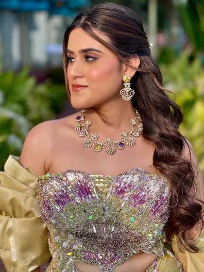 A close-up of the beachside Mehendi makeup. The soft purple smokey eye and radiant skin create a dreamy and romantic look.