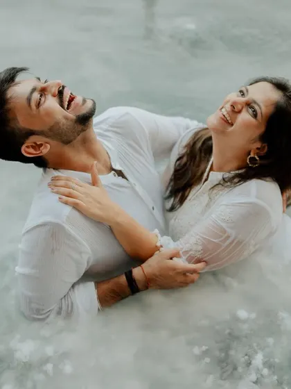 Who says romance can't be playful? This underwater-themed shoot with dry ice was all about creating something unique. The genuine, unrestrained laughter amidst the mist shows that the most creative concepts work best when you can just be yourselves.
