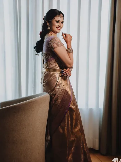 A sweet moment between bride Ishwarya and her sister. My draping ensures my clients are comfortable enough to share these happy, candid moments.
